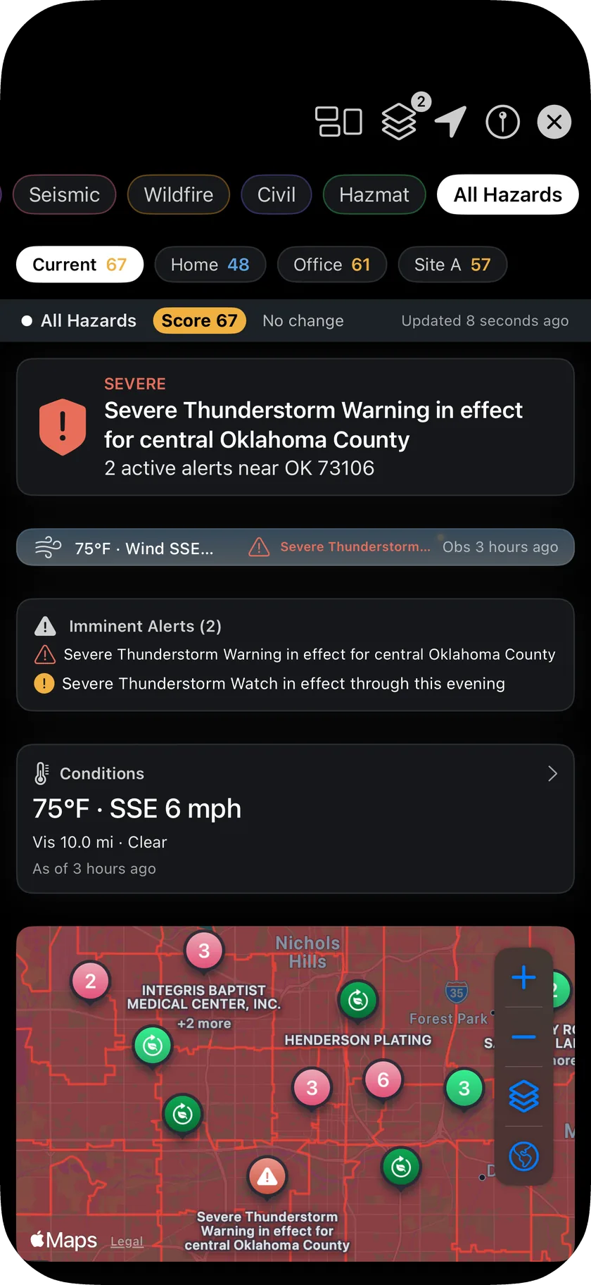Command view: a dark full-screen board with a live hazard map, active alert cards, weather and air quality tiles and a status band with the score